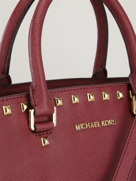 selma tote michael kors|michael kors selma studded.